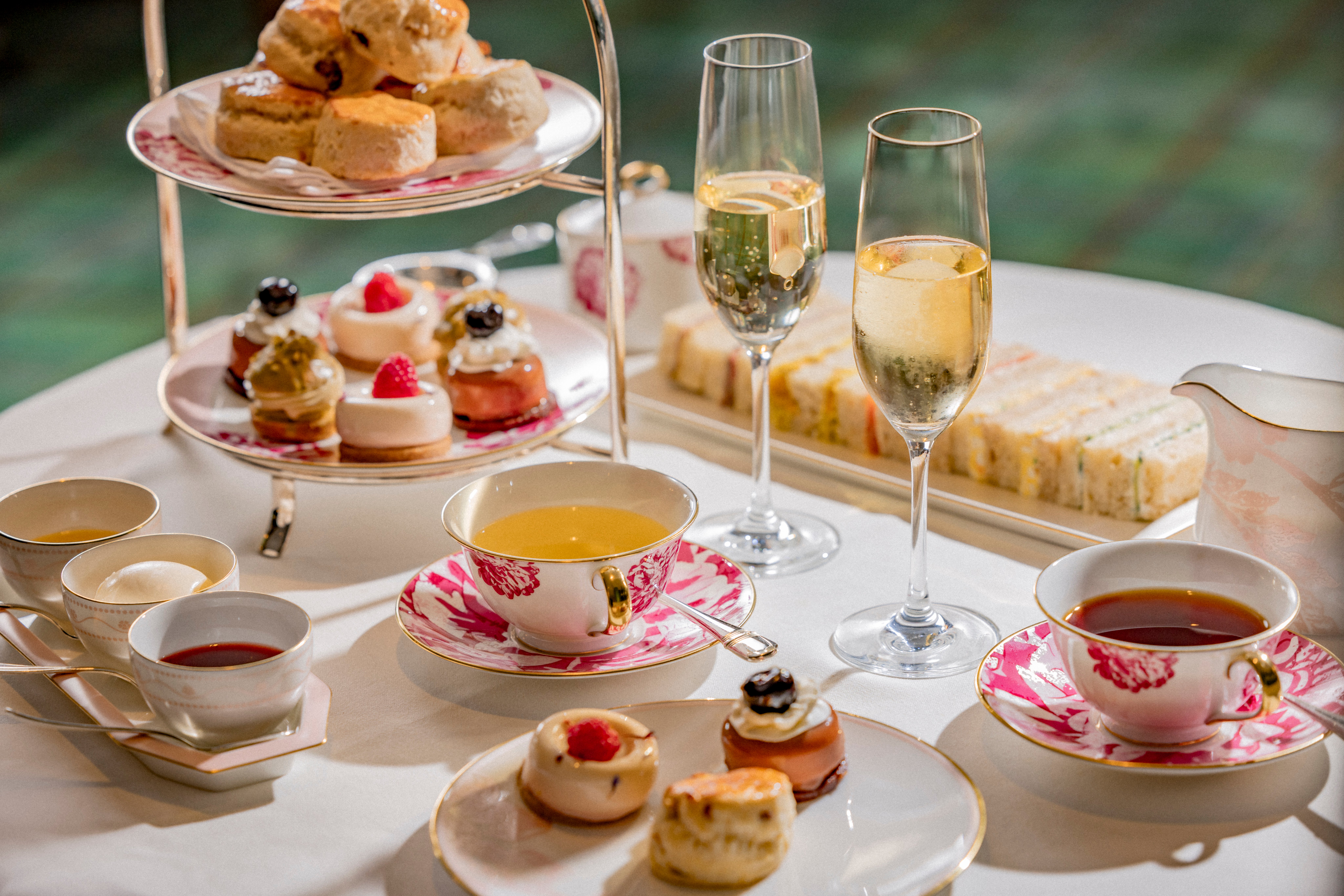Pink and white floral china with tiered platter of sweets and bites for Afternoon Tea in Beverly Hills