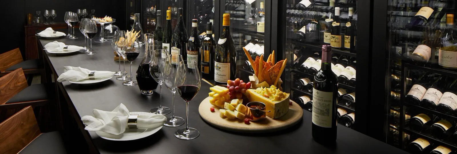 The Dorchester The Wine Vault, red wine being poured and cheese and fruit