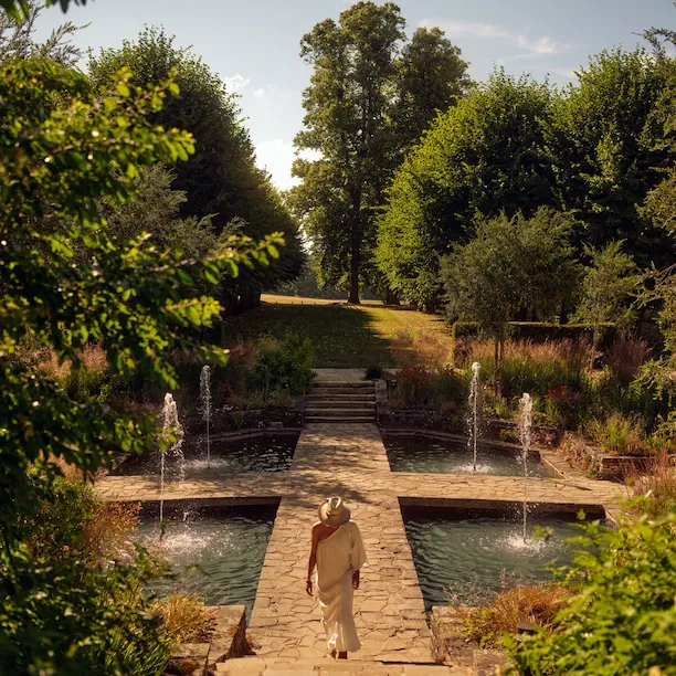 Summer meadow and sunken garden in the grounds of Coworth Park
