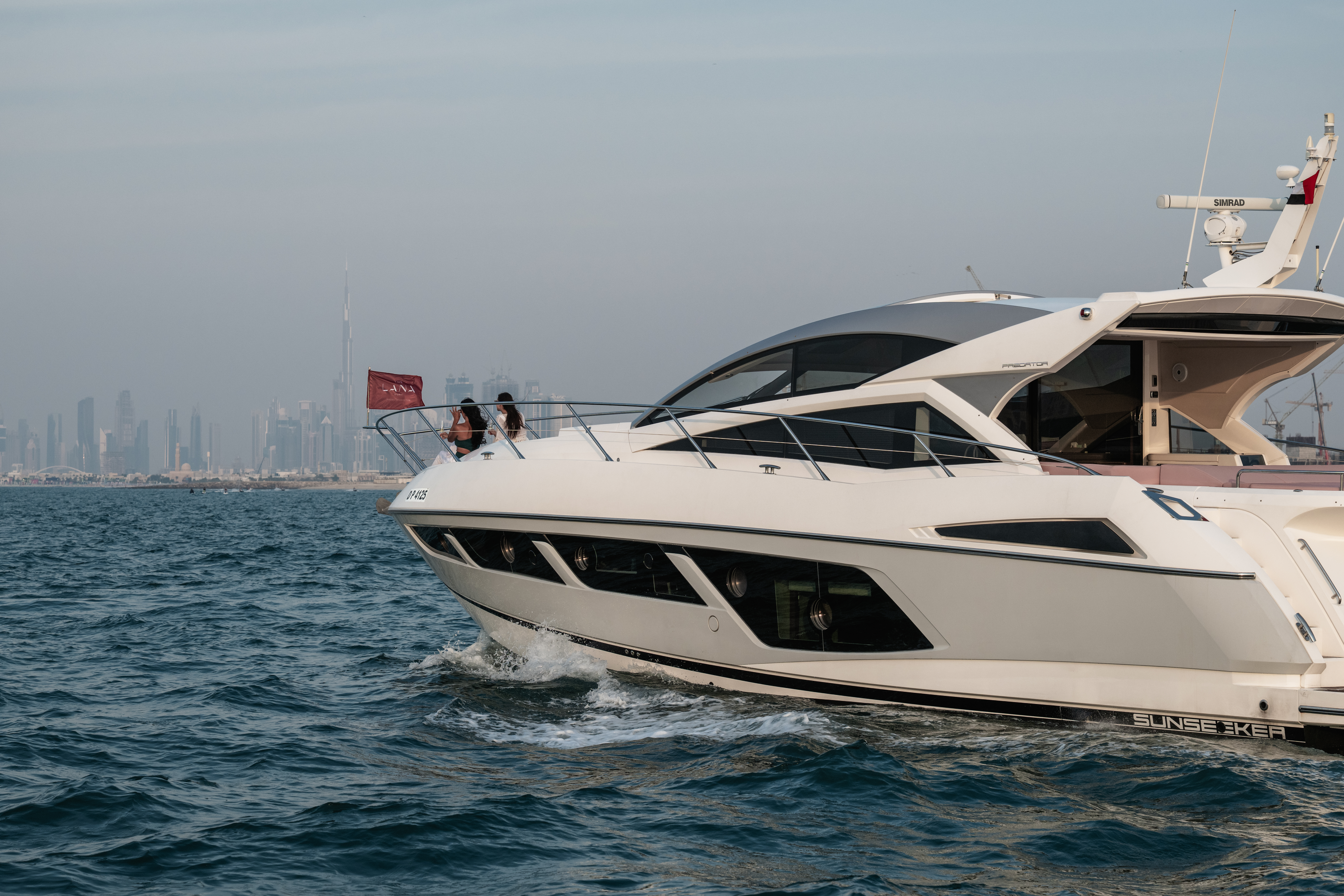 The Lana boat with the Dubai skyline