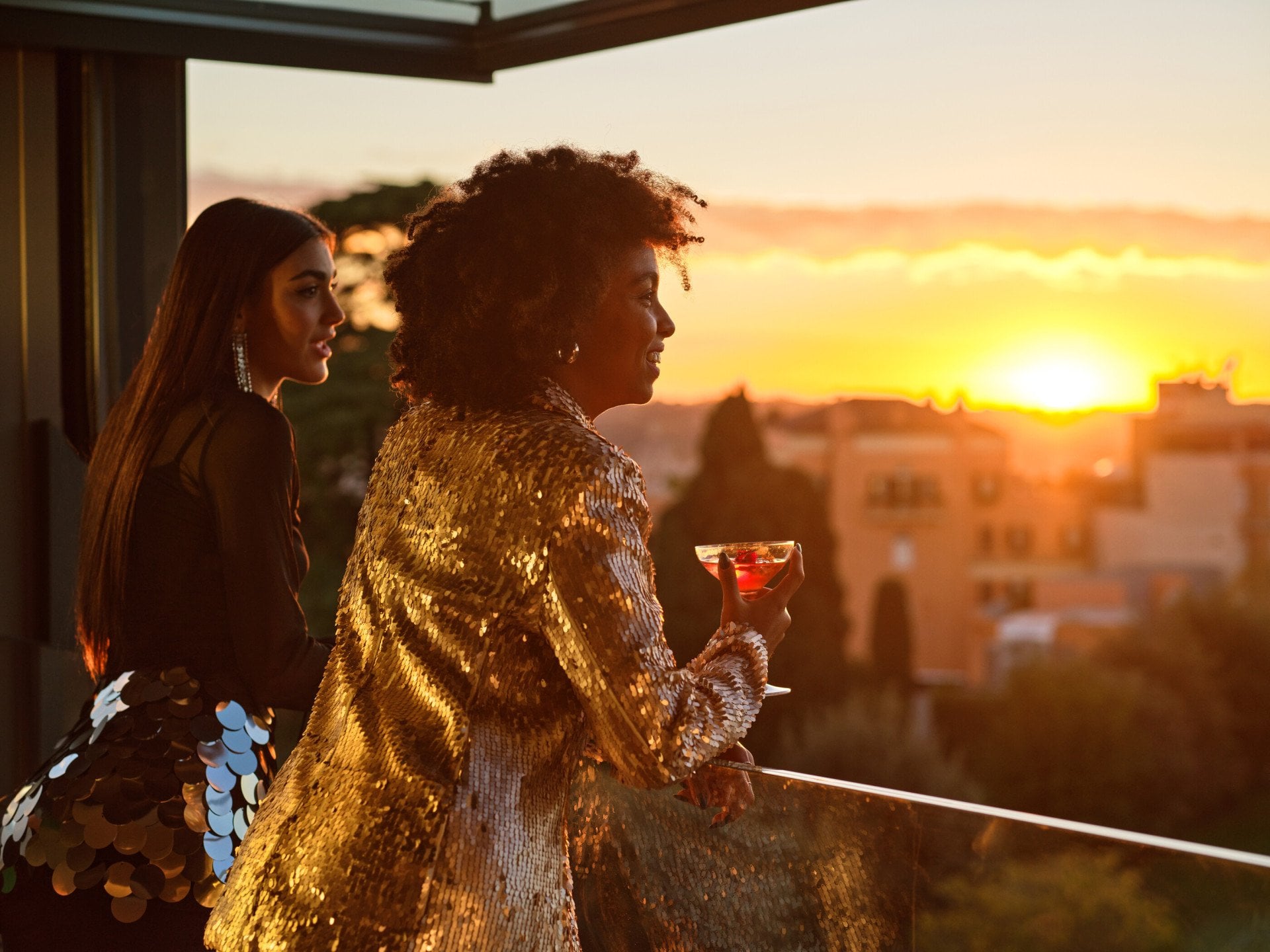 Ladies admiring the sunset view at Il Giardino Ristorante