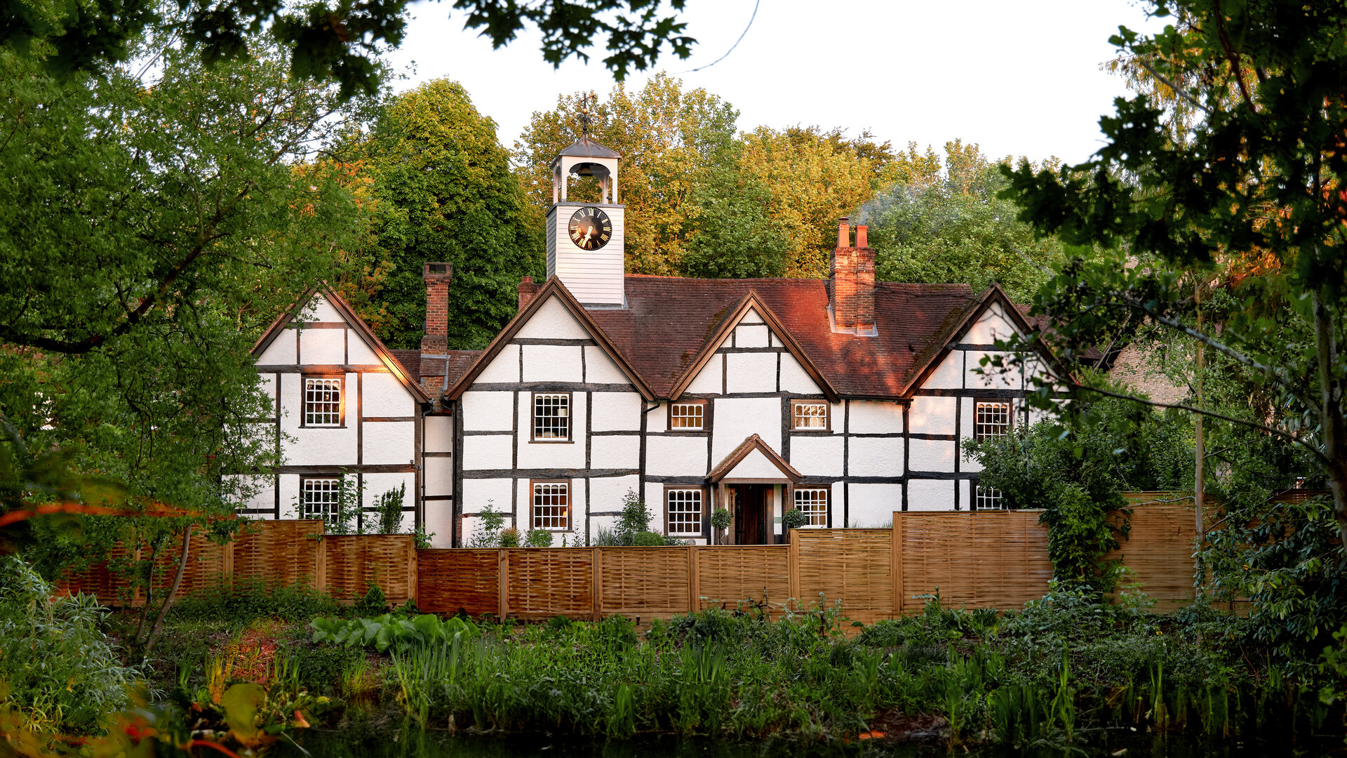 Exterior view of the Dower House signature suite at Coworth Park, Ascot