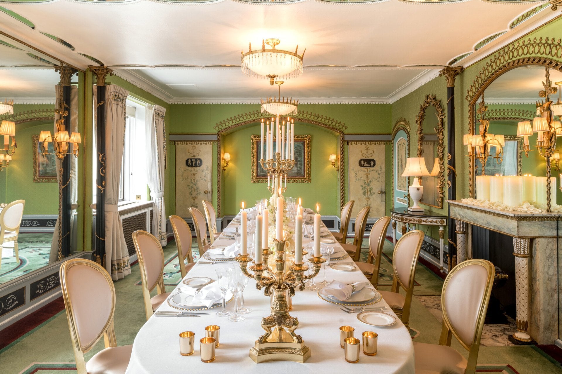 The Dorchester-Pavilion set up dinner with white flowers down the table