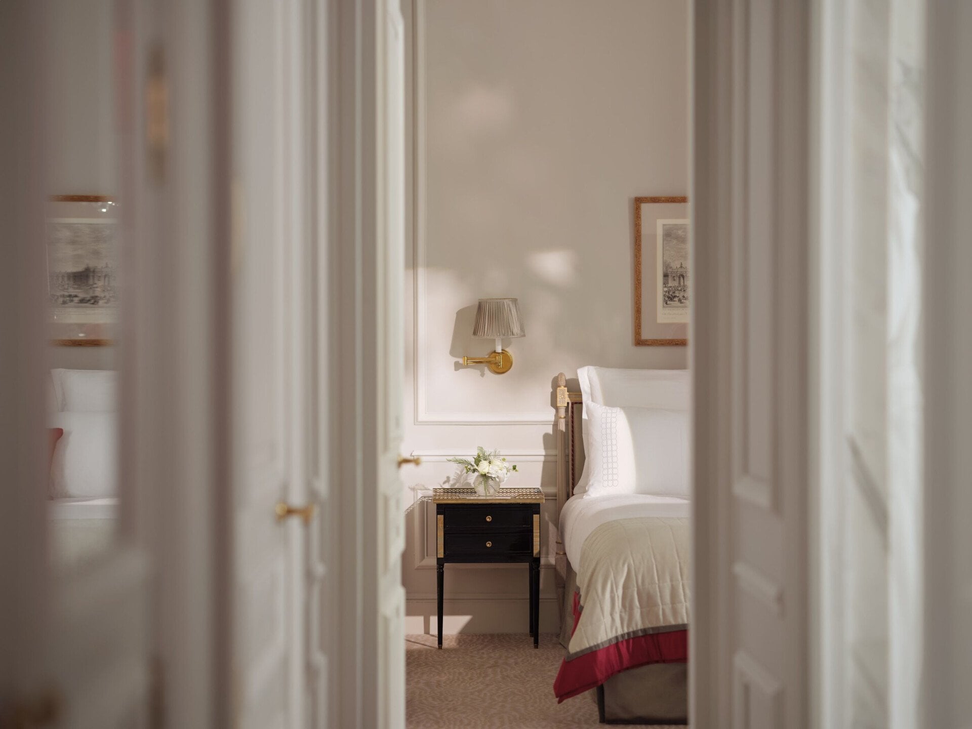 This is the bedroom of the Superior Suite #218 at the Plaza Athénée seen from the living room doors.