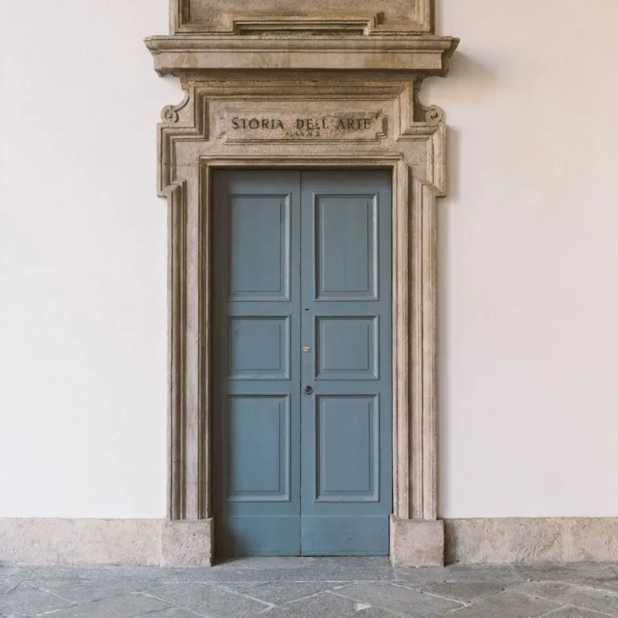 A detail of a door in the courtyard of the Pinacoteca di Brera
