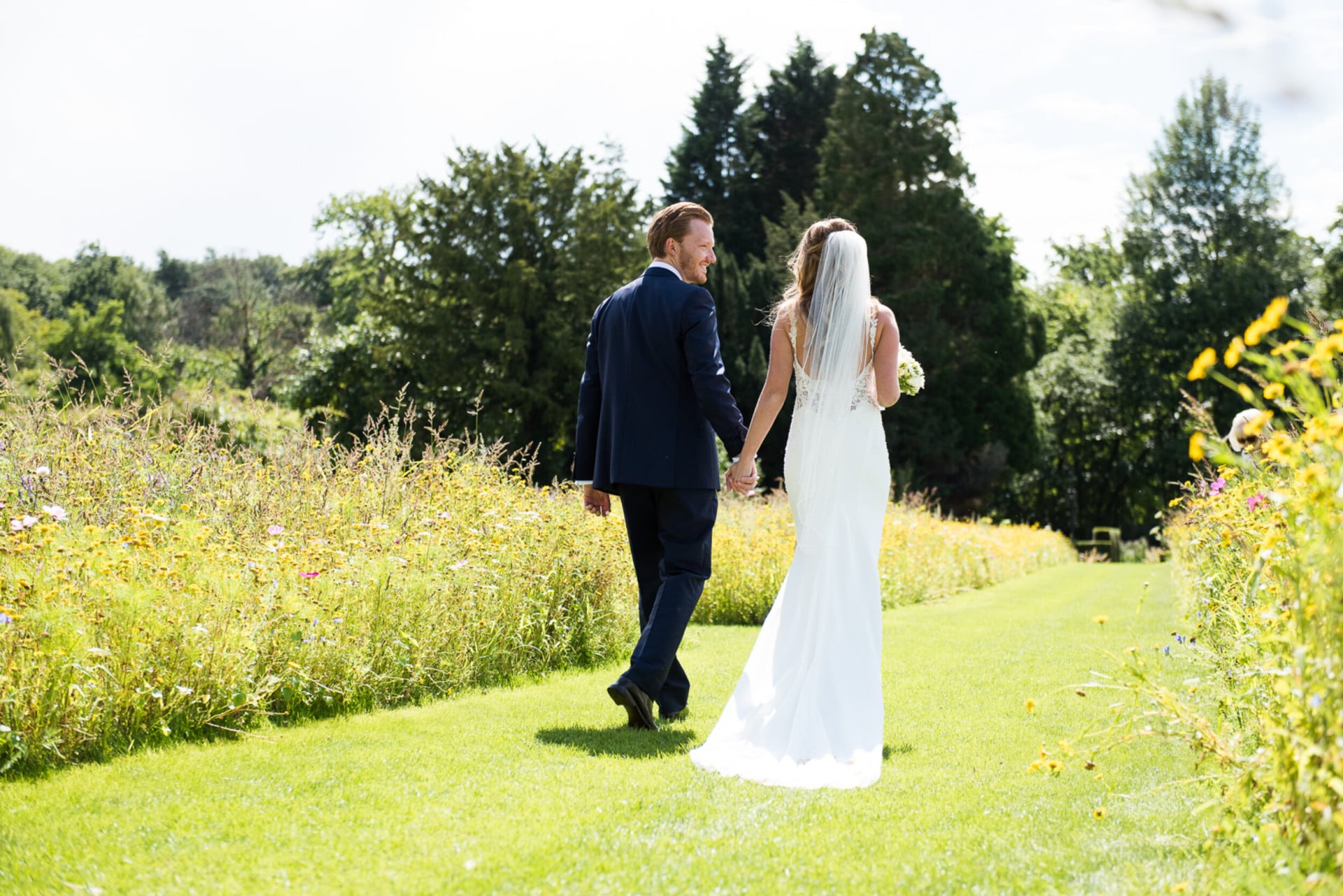 Coworth Park-Weddings-Meadow couple-Credit Fiona Kelly