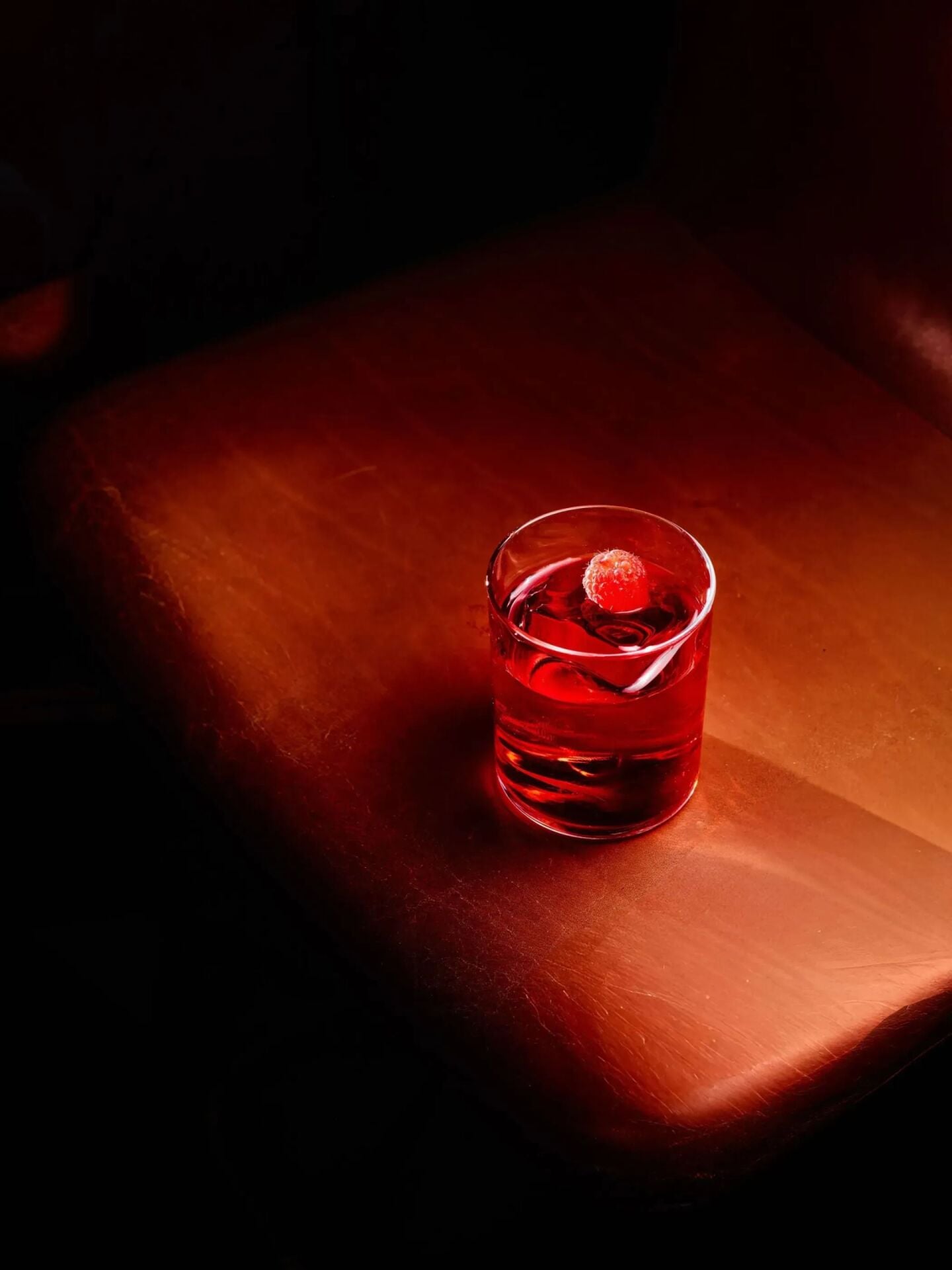 Negroni cocktail served in a cut-crystal tumbler with ice and garnish at The Grill at The Dorchester.