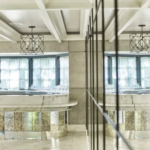 View facing the marble bar in the Garden Ballroom foyer at Hotel Bel-Air.