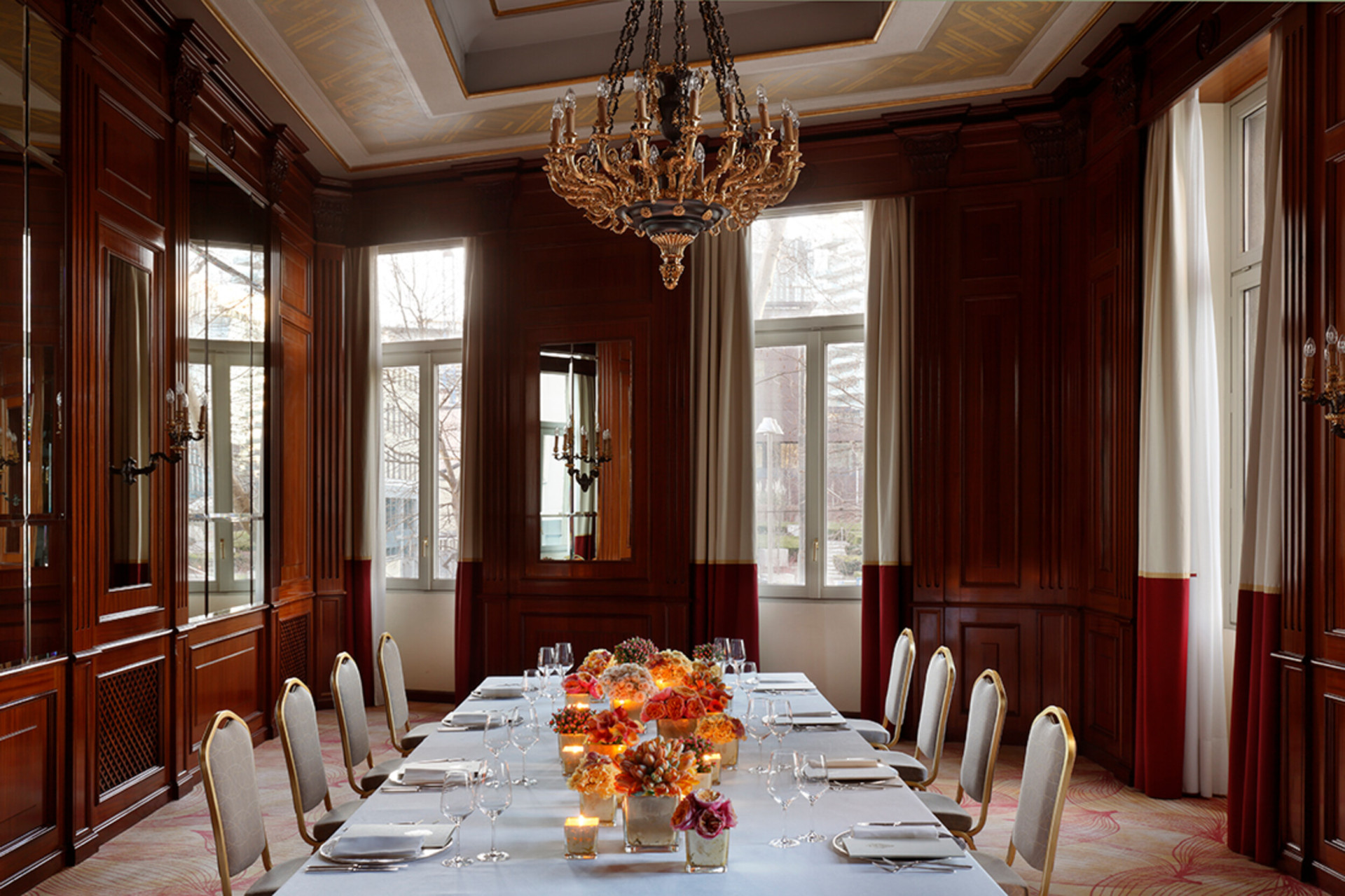Our Club Principe meeting space with a central table laid for dinner