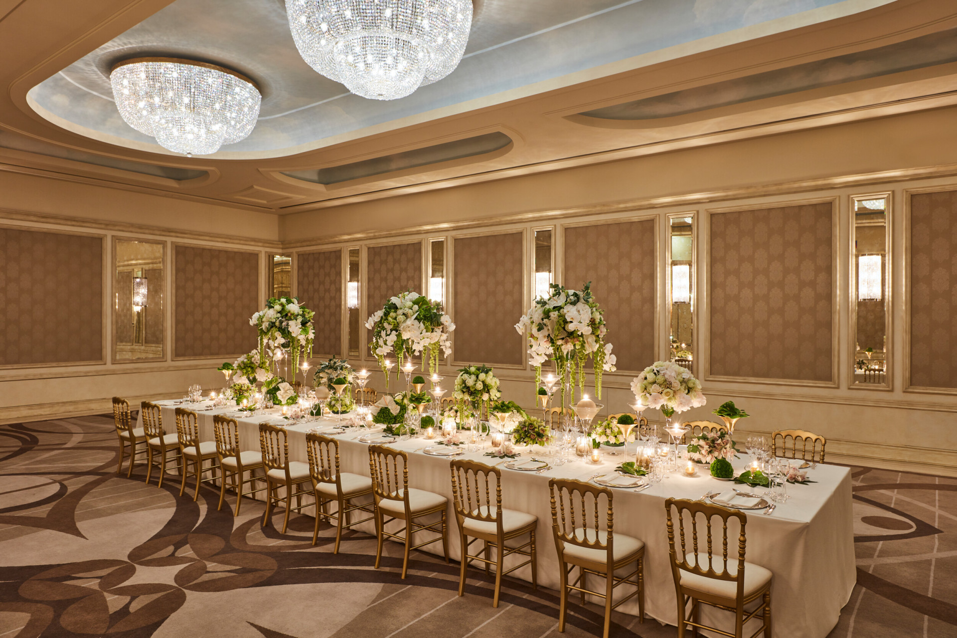 'Cristalli' event space with a large table set up for a gala dinner 