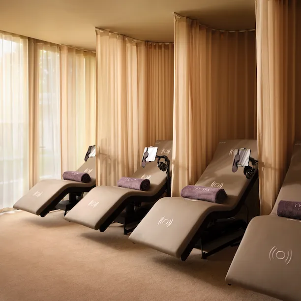Relaxation room with Welnamis loungers at The Spa at Coworth Park
