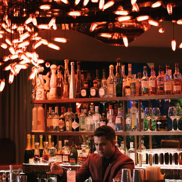 Jara's bartender preparing a cocktail