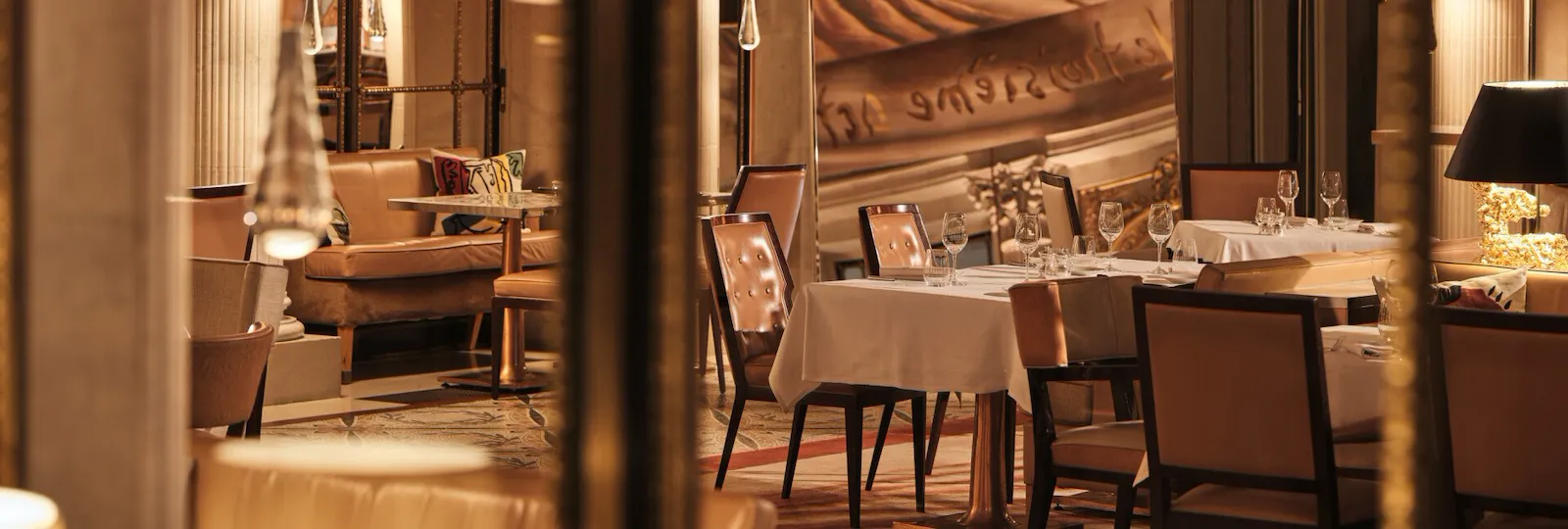 Large view from a window of the Bar 228 on lamps and furnitures of the restaurant Le Dali, at Le Meurice, Paris