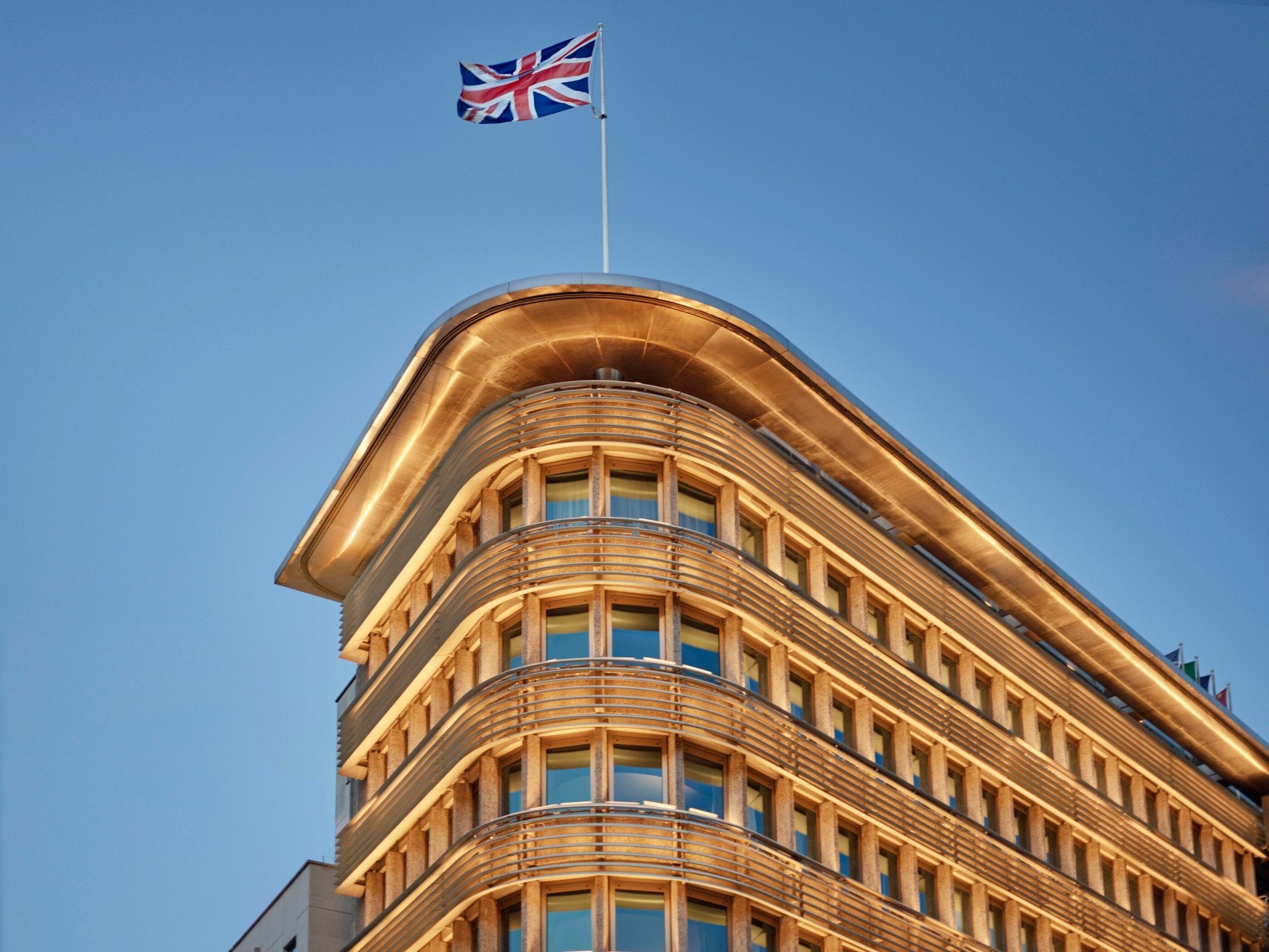 Union Jack flag flying on top of 45 Park Lane, London