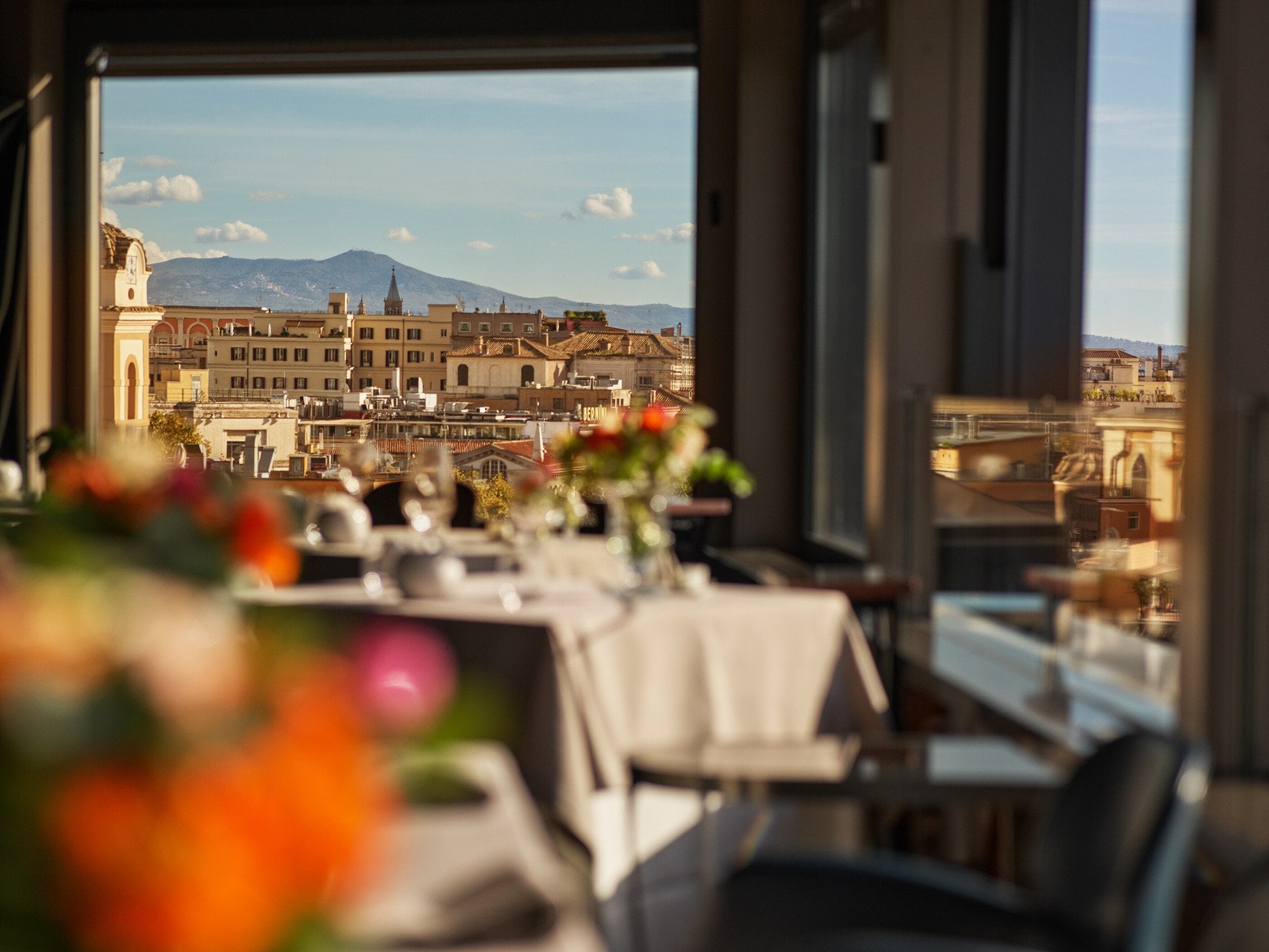 Floral set up tables and panoramic view at La Terrazza 