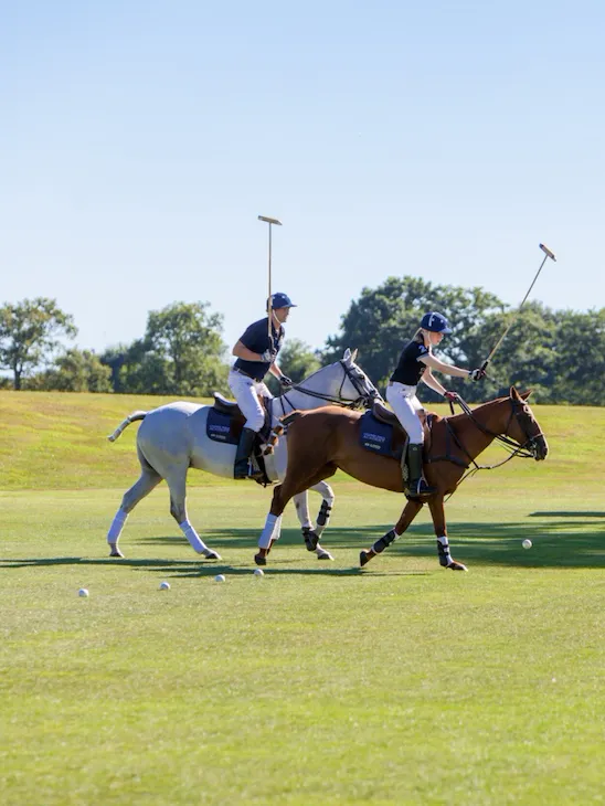 Coworth Park-Guards Polo Academy-lesson-hitting balls in line-highres