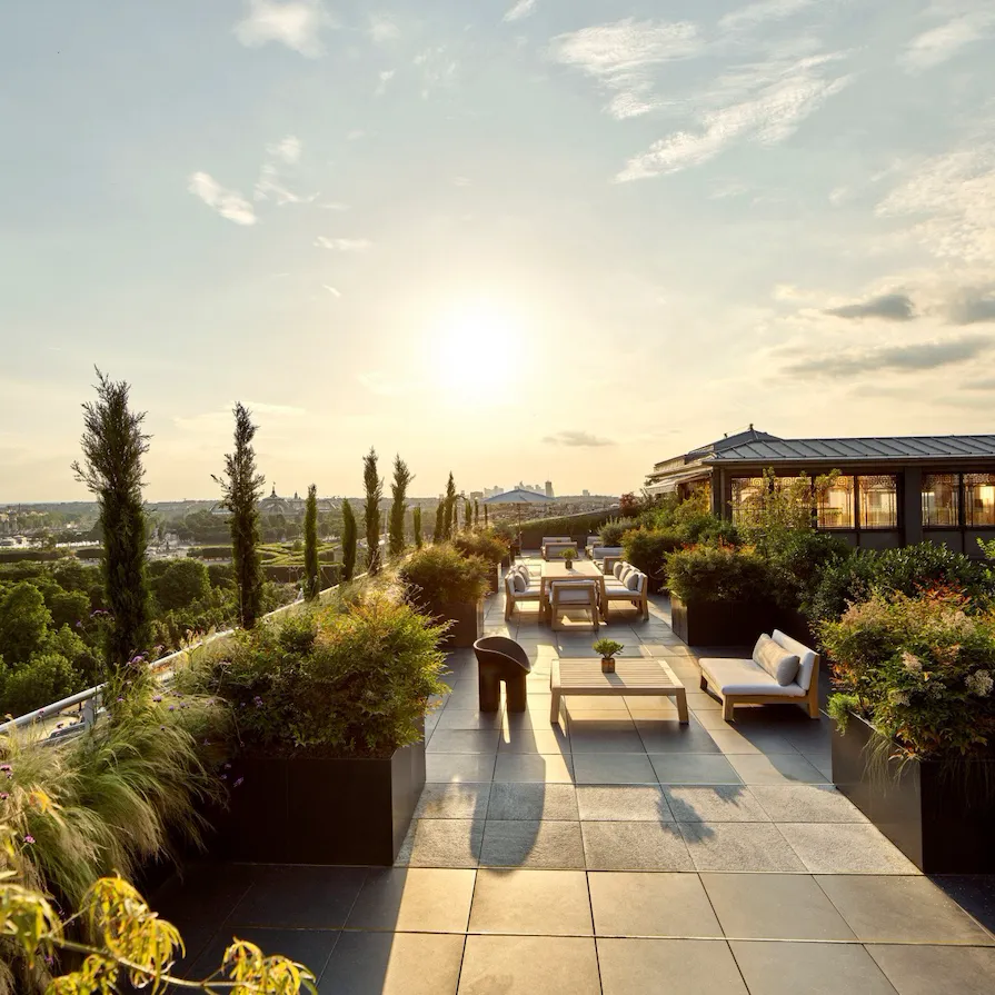 Belle Etoile suite terrace with sunset view of Eiffel Tower, at Le Meurice, Paris.