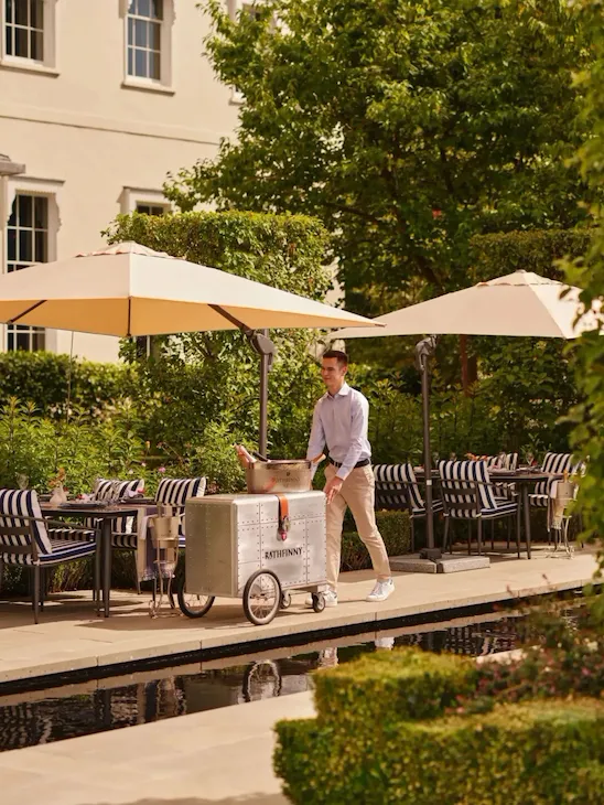 Tide Summer Terrace at Coworth Park with poolside dining and ice cream cart