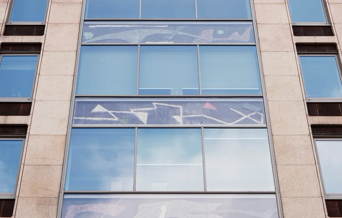 Frontal view of a building in Via Senato 11, Milan