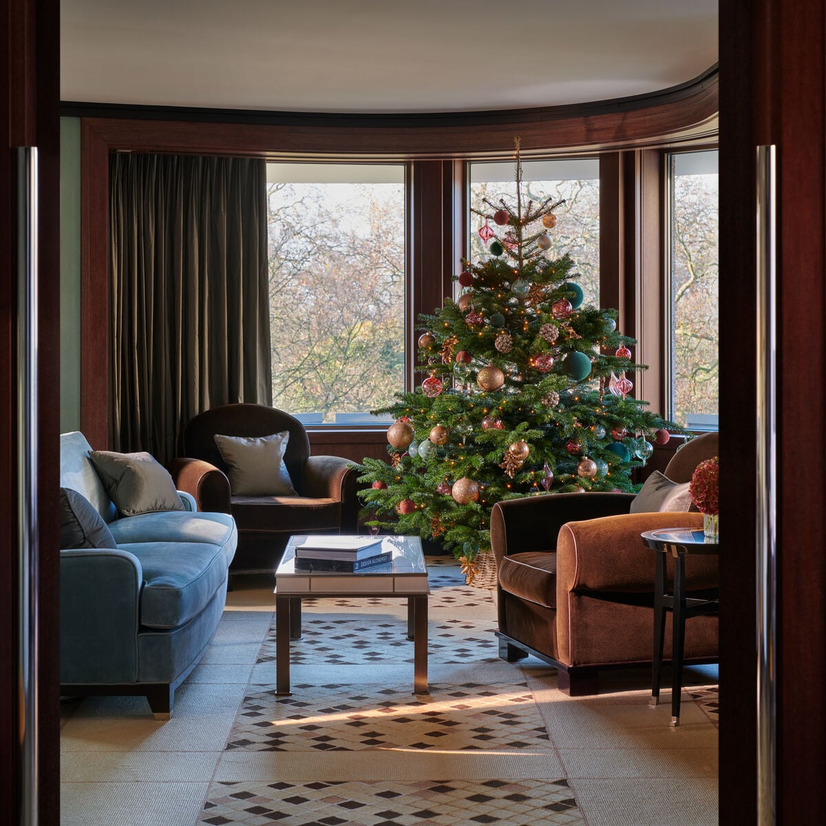 Luxury suite with festive decorations and holiday celebration setup at 45 Park Lane