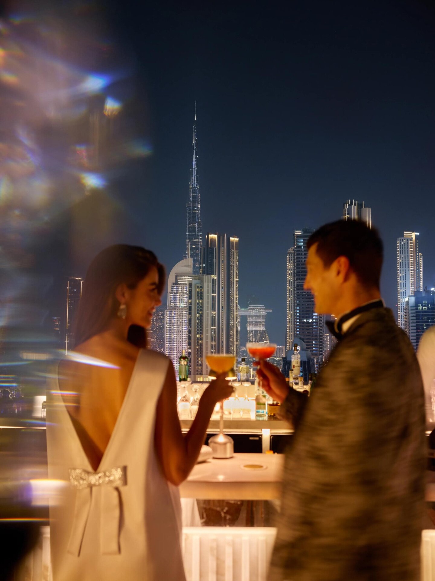A couple enjoying drinks at High Society