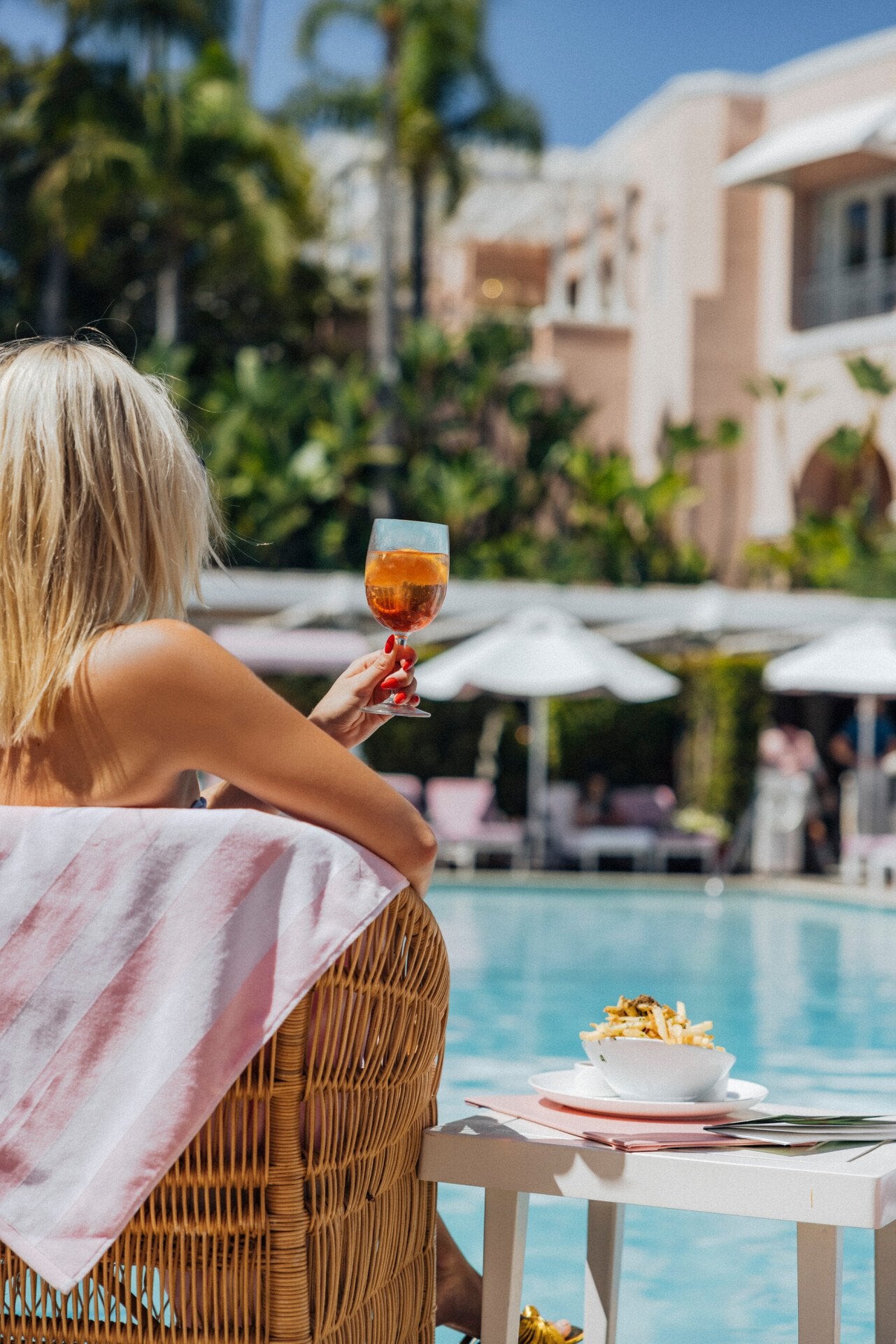 Model enjoying moment at the BHH pool 