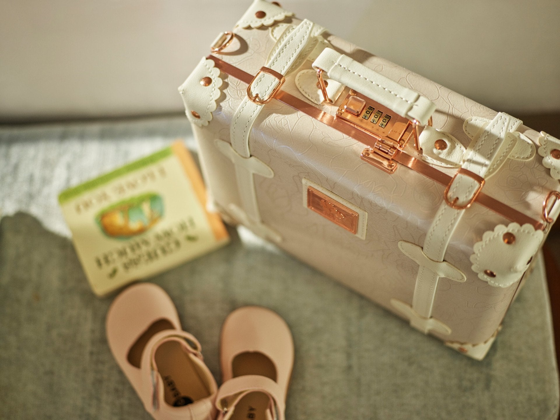 children shoes and suitcase 