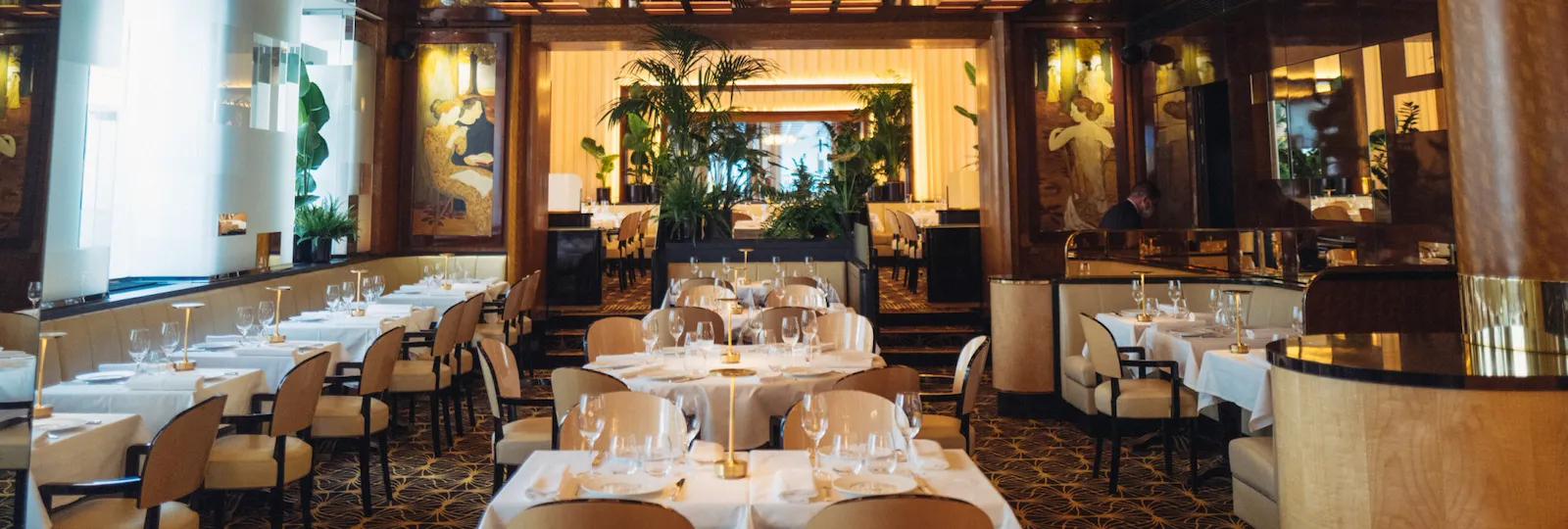 Overview of Le Relais Plaza's dining room upper and lower deck, at Hotel Plaza Athénée, Paris