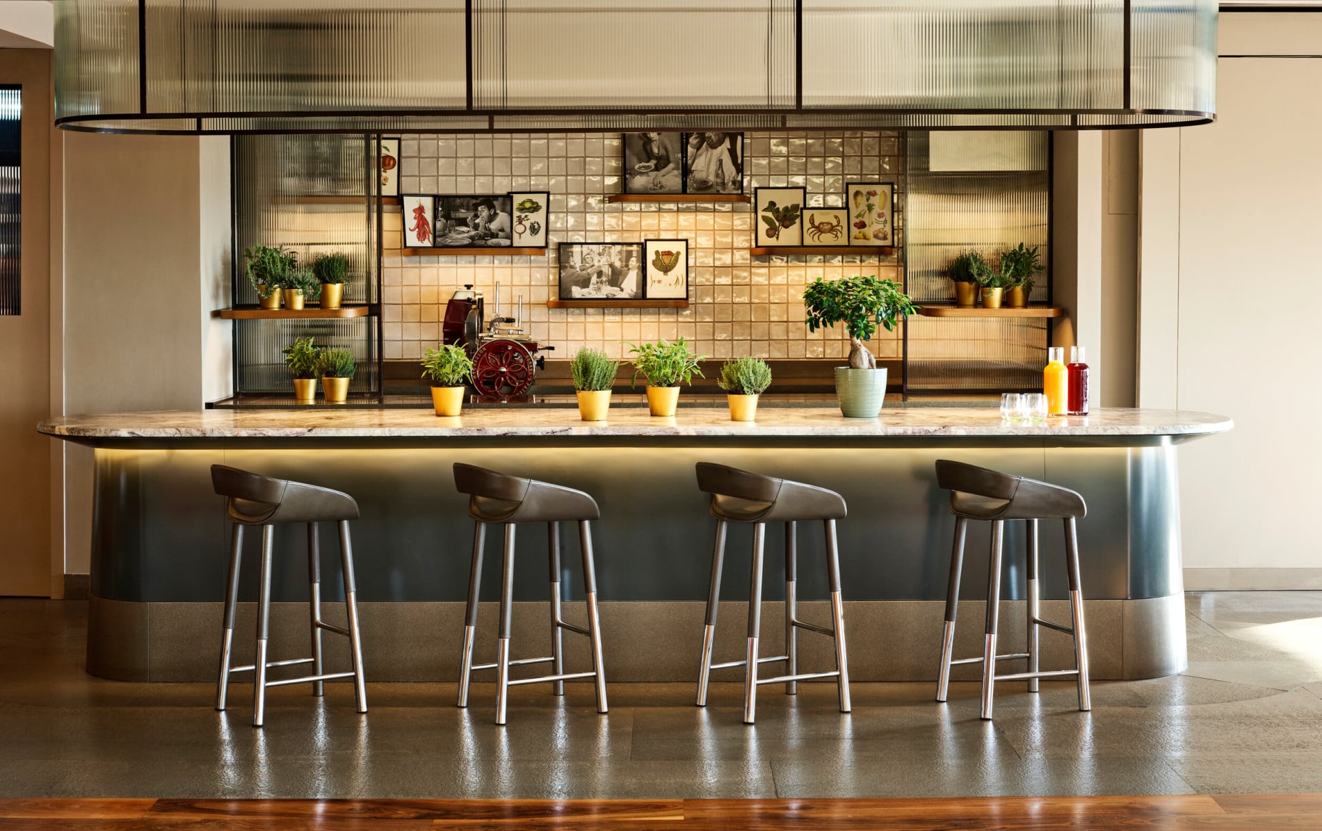 Sharing table with stools at Il Giardino Ristorante, Hotel Eden, Rome