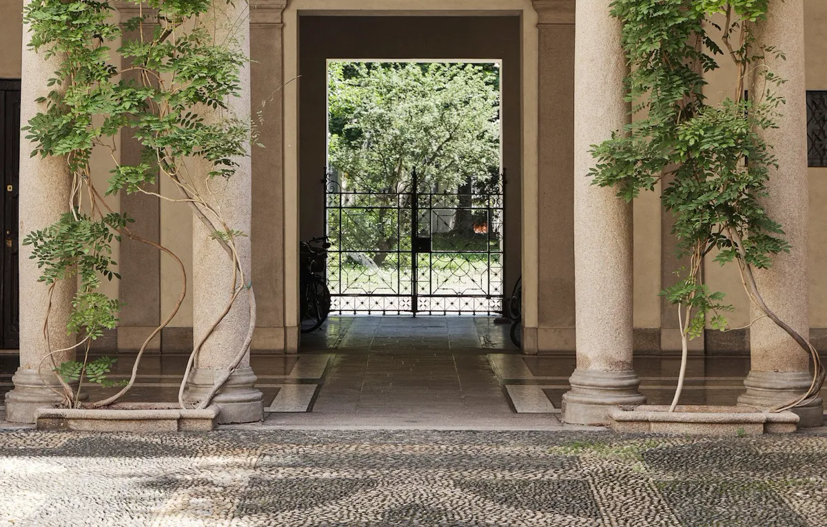 View of a Brera courtyard with arches and plants