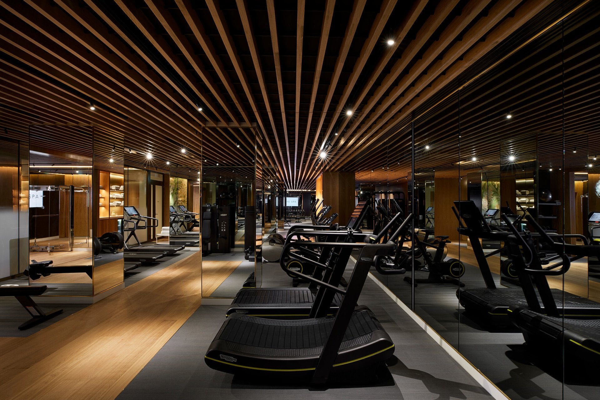 Curved treadmills in the gym at The Spa at 45 Park Lane/Mayfair Park Residences, London