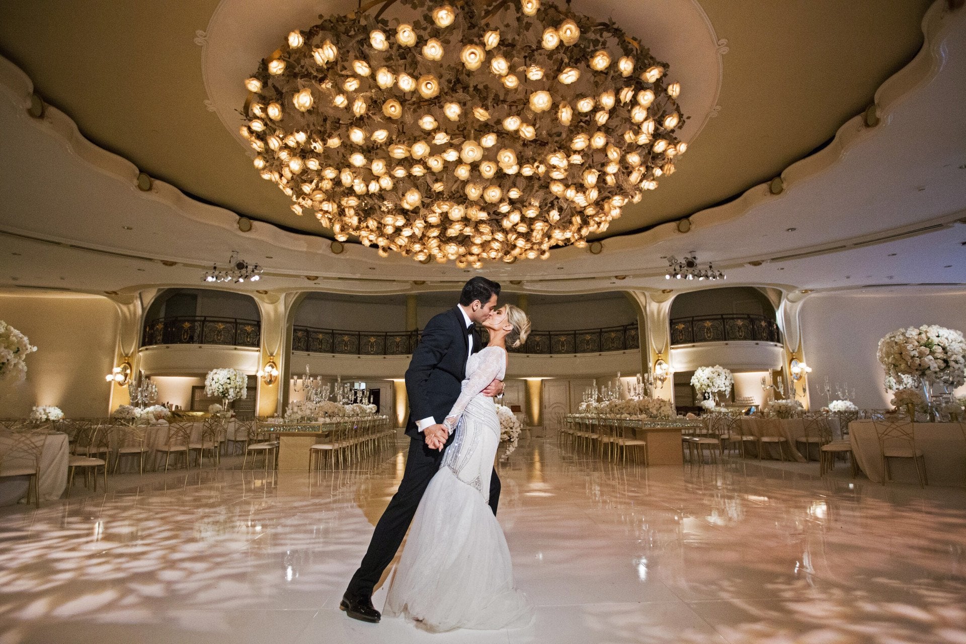 Wed couple kissing each other