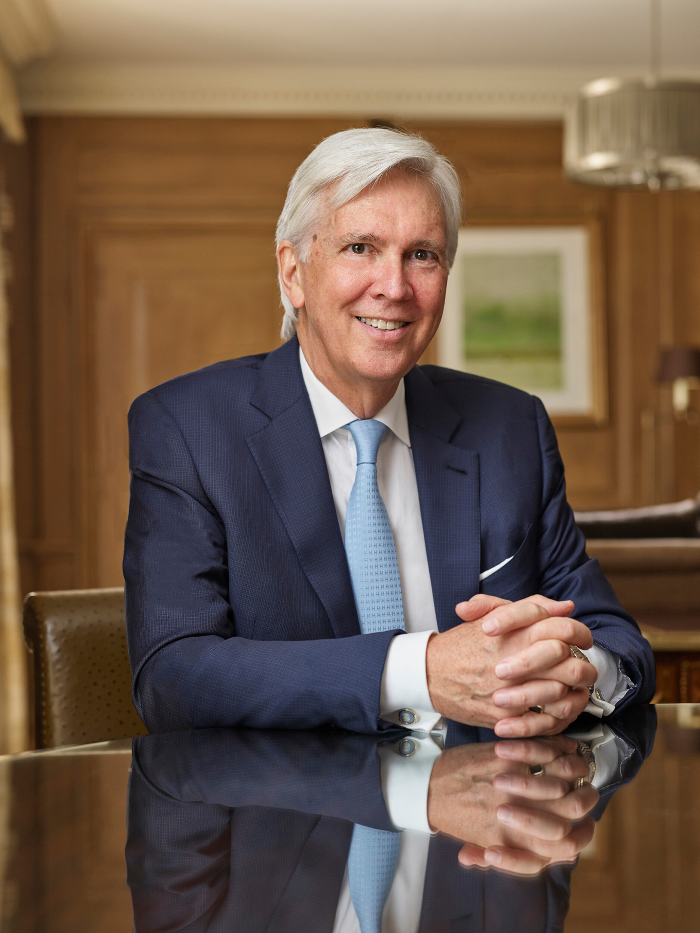 Portraits of Christopher Cowdray, the president of The Dorchester Collection group